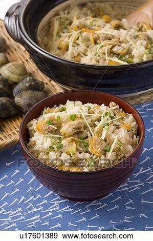 Stock Photo - Bowl of rice cooked with clams. Fotosearch