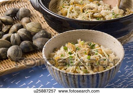 Bowl of rice cooked with clams View Large Photo Image Stock Photo - Bowl of rice cooked with clams. Fotosearch