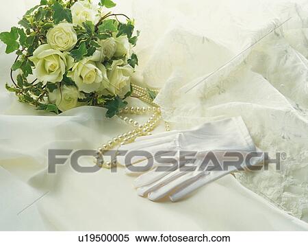 Bridal bouquet, gloves and pearls View Large Photo Image Stock Photography - Bridal bouquet, gloves and pearls. Fotosearch