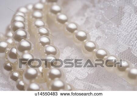 Stock Image - Bridal lace and pearls. Fotosearch