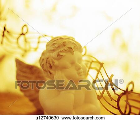 Cherub statue View Large Photo Image Stock Image - Cherub statue. Fotosearch
