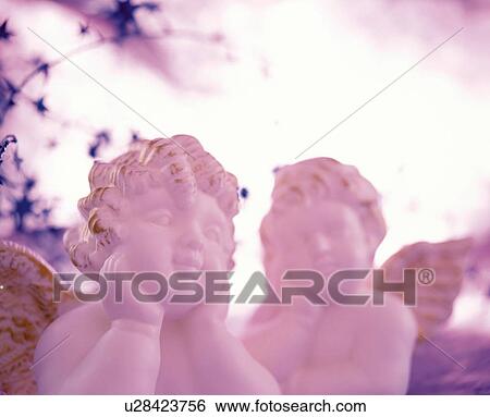 Cherub statues View Large Photo Image Stock Photograph - Cherub statues. Fotosearch