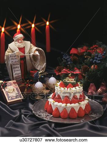 Christmas Display with Cake, Candles and Ornaments View Large Photo Image Stock Photo - Christmas Display with Cake, Candles and Ornaments. Fotosearch