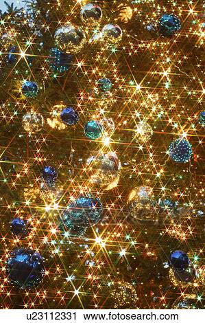 Stock Image - Christmas tree with blue and silver baubles. Fotosearch