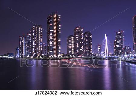 Stock Image - Chuo-ku at night, Tokyo, Japan. Fotosearch