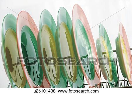 Clean dishes drying on rack View Large Photo Image Stock Photo - Clean dishes drying on rack. Fotosearch