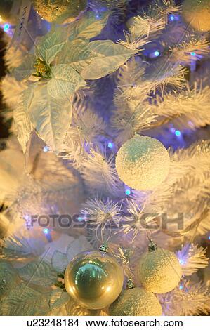 Close-up of a silver, blue and white Christmas tree View Large Photo Image Picture - Close-up of a silver, blue and white Christmas tree. Fotosearch
