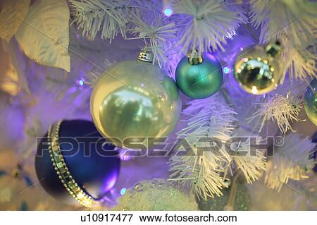 Close-up of a silver, blue and white Christmas tree View Large Photo Image Stock Photo - Close-up of a silver, blue and white Christmas tree. Fotosearch