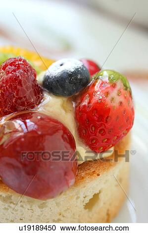 Close up of glazed fruit on a cake View Large Photo Image Stock Image - Close up of glazed fruit on a cake. Fotosearch