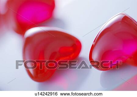 Stock Photograph - Close-up of heart shaped bath oils. Fotosearch