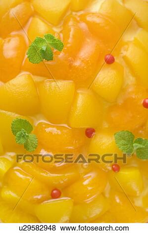 Close up of Orange and peach tart, full frame View Large Photo Image Stock Photo - Close up of Orange and peach tart, full frame. Fotosearch