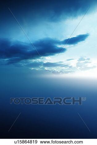 Stock Photo - Clouds in sky. Fotosearch