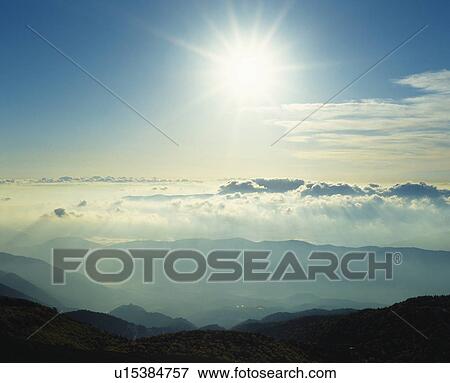 Clouds over landscape View Large Photo Image Stock Photo - Clouds over landscape. Fotosearch