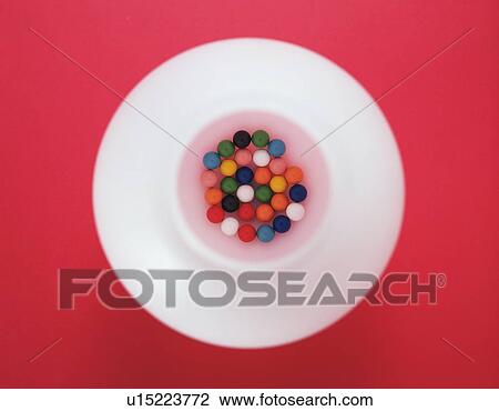 Stock Image - Colorful candy in bowl. Fotosearch