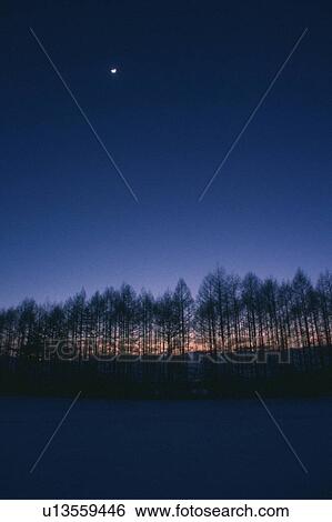 Crescent moon in the sky over a rural winter landscape View Large Photo Image Stock Photograph - Crescent moon in the sky over a rural winter landscape. Fotosearch