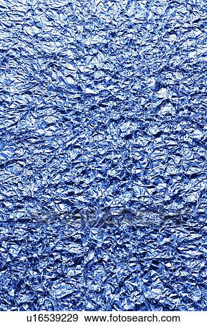 Stock Photo - Crumpled Blue Aluminum Foil . Fotosearch