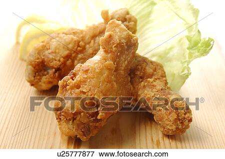 Deep fried chicken, close up View Large Photo Image Stock Photo - Deep fried chicken, close up. Fotosearch