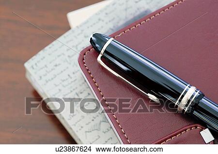 Picture - Diary and fountain pen. Fotosearch