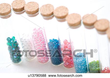 Different colored beads in jars View Large Photo Image Stock Photo - Different colored beads in jars. Fotosearch