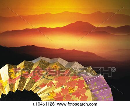 Folding fan in front of mountain range View Large Photo Image Stock Photograph - Folding fan in front of mountain range. Fotosearch