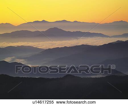 Stock Photography - Forest covered mountain range, Yoshino-machi, Nara Prefecture, Japan. Fotosearch