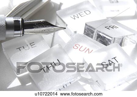 Fountain pen and day-of-the-week block View Large Photo Image Picture - Fountain pen and day-of-the-week block. Fotosearch