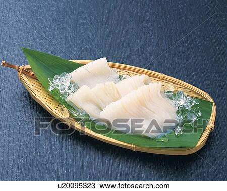 Fresh squid served on a bamboo basket with a leaf and ice cubes View Large Photo Image Stock Image - Fresh squid served on a bamboo basket with a leaf and ice cubes. Fotosearch