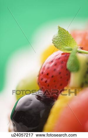 Fruit tart, close up, colored background View Large Photo Image Stock Photo - Fruit tart, close up, colored background. Fotosearch