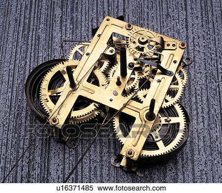 Stock Photography - Gears in a winding mechanism. Fotosearch