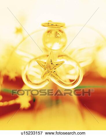 Stock Photo - Glass Christmas angel. Fotosearch