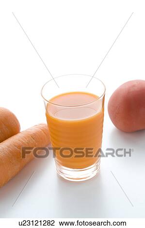 Stock Image - Glass of Carrot Juice. Fotosearch