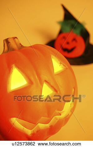 Stock Image - Jack O'Lantern and a witches hat. Fotosearch
