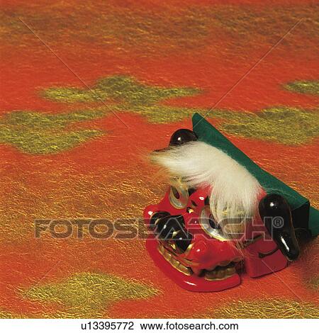 Stock Image - Japanese lion ornament. Fotosearch