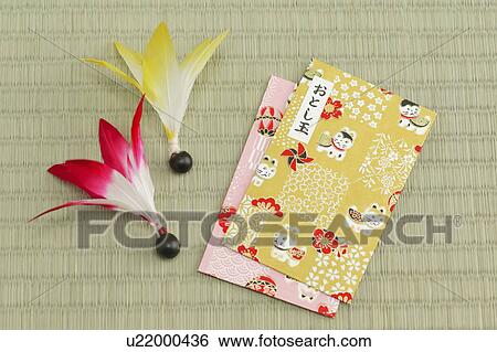 Japanese money envelopes and battledores View Large Photo Image Stock Photograph - Japanese money envelopes and battledores. Fotosearch