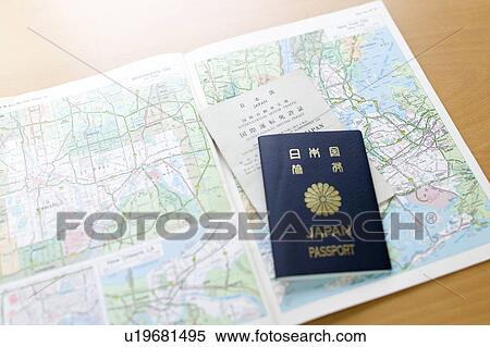 Stock Photography - Japanese passport and map. Fotosearch