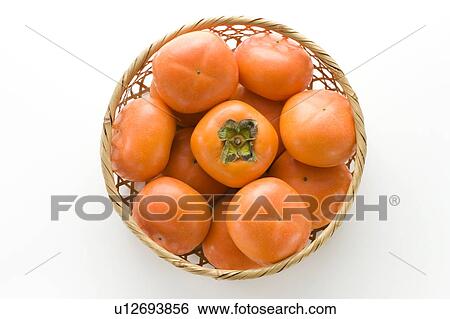 Japanese Persimmon in Basket View Large Photo Image Stock Photograph - Japanese Persimmon in Basket. Fotosearch