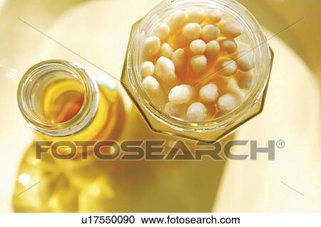 Jar of olive oil and picked asparagus View Large Photo Image Stock Image - Jar of olive oil and picked asparagus. Fotosearch