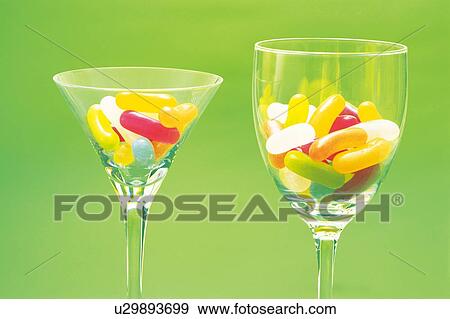 Jellybeans in drinking glasses View Large Photo Image Stock Photo - Jellybeans in drinking glasses. Fotosearch