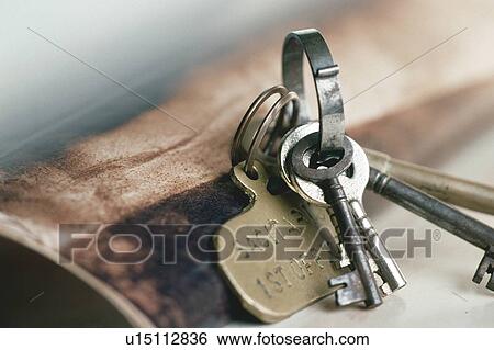 Stock Photograph - Keys on a metal chain. Fotosearch
