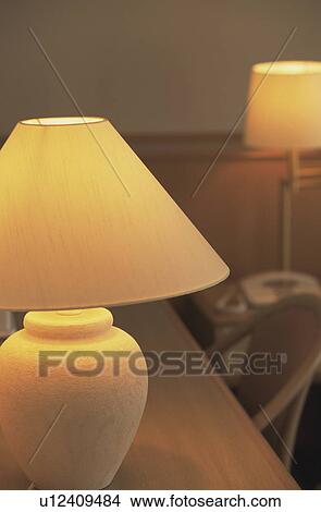 Lamp on a desk View Large Photo Image Picture - Lamp on a desk. Fotosearch