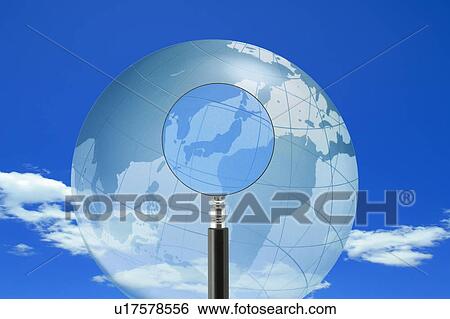 Stock Photograph - Magnifier and Globe in Blue Sky. Fotosearch
