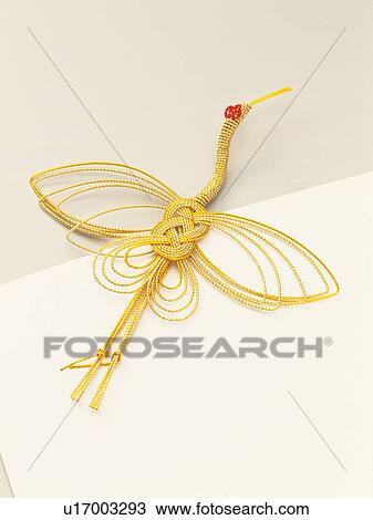 Stock Image - Mizubiki, Japanese figurine in the shape of a crane. Fotosearch