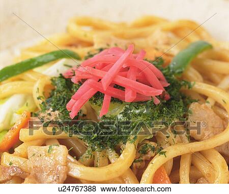 Noodles garnished with herbs and ginger View Large Photo Image Stock Photo - Noodles garnished with herbs and ginger. Fotosearch