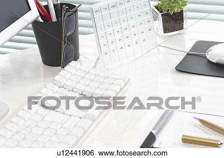Stock Photograph - Objects on a desk. Fotosearch