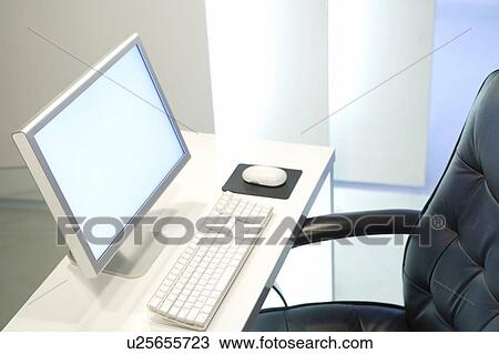 Stock Image - Office desk with computer. Fotosearch