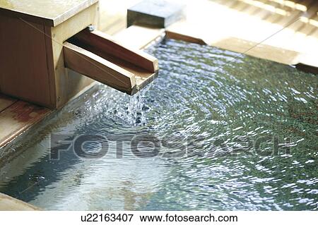 Stock Photo - Open air spa bath. Fotosearch