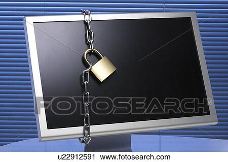 Stock Image - Padlock and chain around a computer monitor. Fotosearch