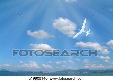 Stock Image - Paper airplane flying over the ocean. Fotosearch