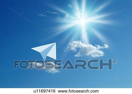 Paper airplane flying towards the sun View Large Photo Image Stock Photograph - Paper airplane flying towards the sun. Fotosearch