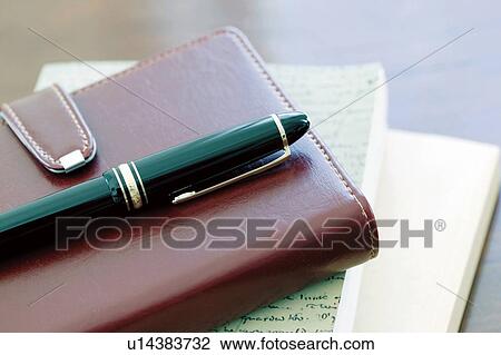 Personal organizer and fountain pen View Large Photo Image Stock Image - Personal organizer and fountain pen. Fotosearch